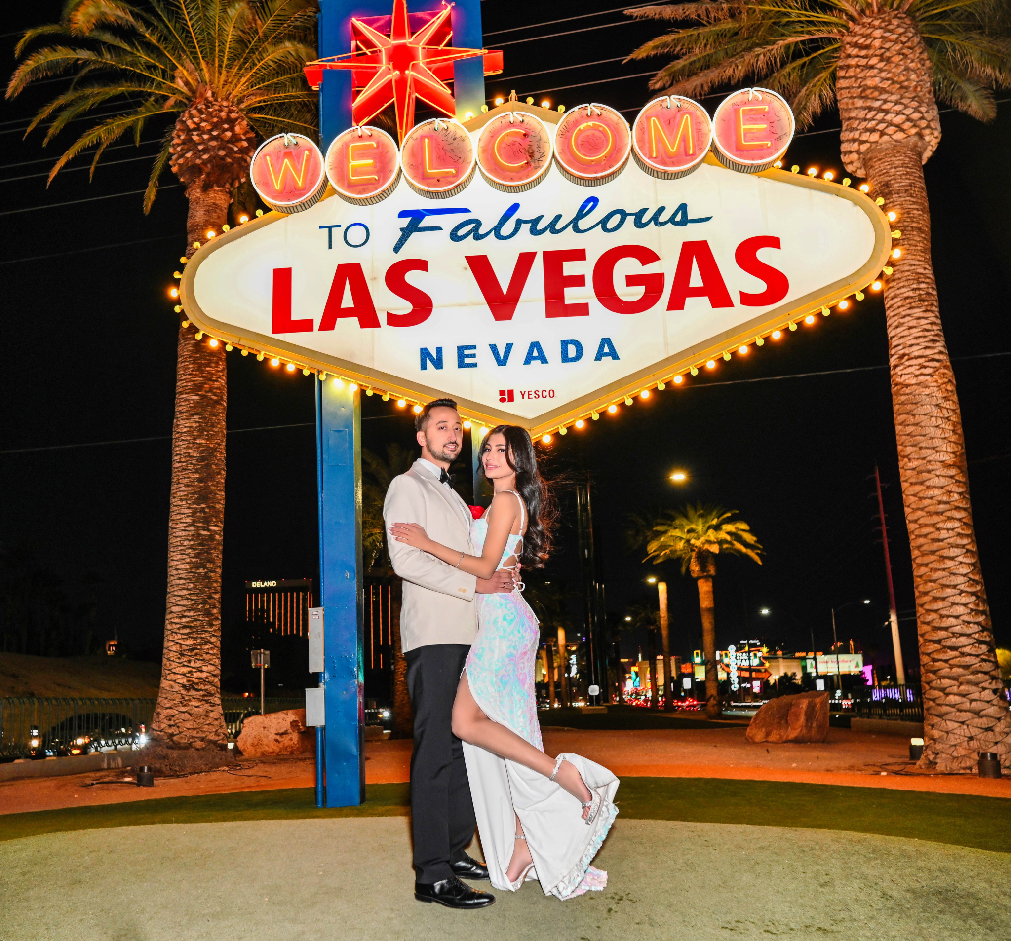 Full-width frame — the couple, late in the evening